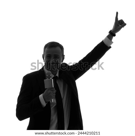 Silhouette of mature journalist with microphone pointing at something on white background