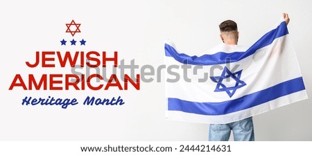 Man with flag of Israel on light background, back view. Banner for Jewish American Heritage Month