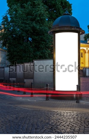 Blank Round Street Advertising Billboard Mockup At Night. Outdoor Media Lightbox In The Old Town