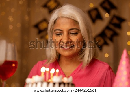 Close-up portrait of an old lady celebrating her birthday