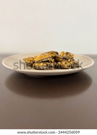 Grilled abalone(ear shell) with butter and salt. Korean food Royalty-Free Stock Photo #2444256059