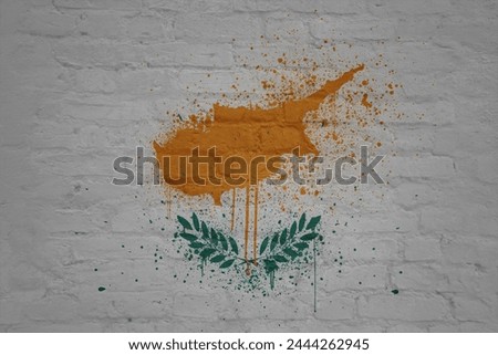 colorful painted big national flag of cyprus on a massive old brick wall