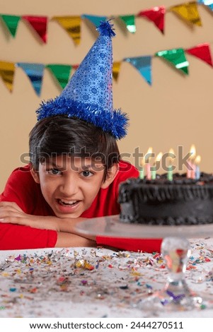 Portrait of happy boy celebrating his birthday