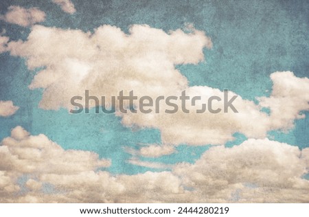 Retro sky photo. Old vintage paper with clouds and sky.