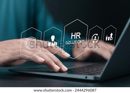 HR Solutions concept. Person use laptop with human resources solutions icons for human resources management tool used to manage employee information in organization.