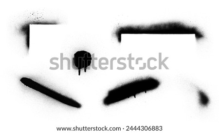 Set of graffiti spray paint. Hand drawn design elements. Isolated vector grunge image black on white.	
