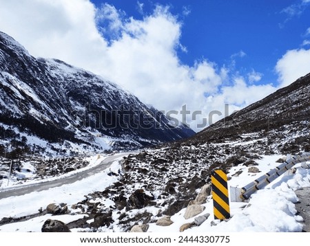 Sela Pass is a mountain pass located on the border between the Tawang and West Kameng districts of Arunachal Pradesh, India. Sela pass is one of the highest motorable mountain passes in the world. Royalty-Free Stock Photo #2444330775