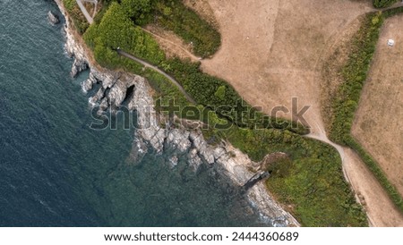 Aerial shot of coastline and footpath