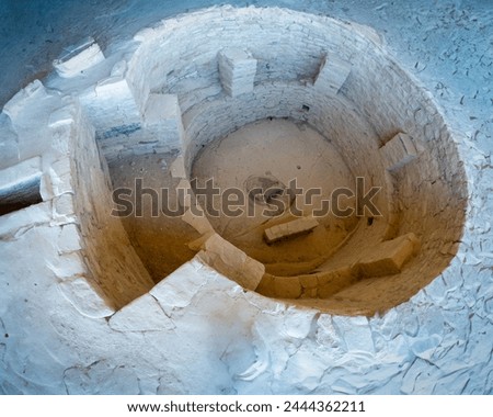 Kiva in Balcony House at Mesa Verde National Park in Colorado protects Ancestral Puebloan sites including famous cliff dwellings. Balcony House well-preserved rooms, kivas, and plazas. Royalty-Free Stock Photo #2444362211