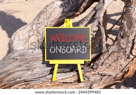 Welcome onboard symbol. Concept words Welcome onboard on beautiful black yellow blackboard. Beautiful tree background. Business, motivational welcome onboard concept. Copy space.