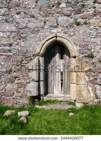 Old castle doorway at Artramon Castle, Co. Wexford, Ireland. Royalty-Free Stock Photo #2444420077