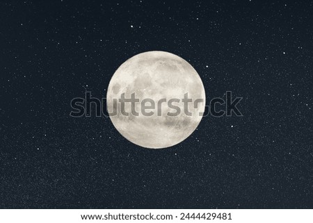 Huge full moon on the night sky with bright stars