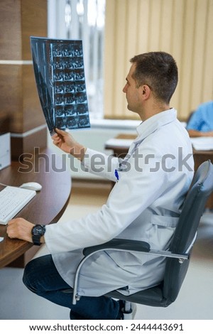 Computer medical healthcare specialist. Doctor working in modern hospital office.
