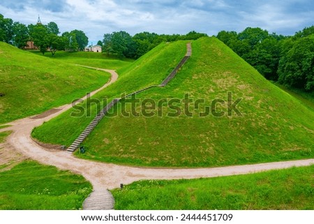 The Hillforts of Kernave, ancient capital of Grand Duchy of Lithuania. Royalty-Free Stock Photo #2444451709