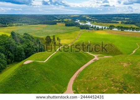 Panorama view of the Hillforts of Kernave, ancient capital of Grand Duchy of Lithuania. Royalty-Free Stock Photo #2444452431