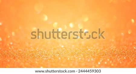 Banner background size. Defocus lights are yellow and orange. Glitter.