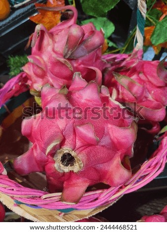 a close up photo of red dragon fruit