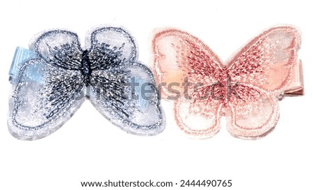 Butterfly hair bands made from spirals must be suitable for children and adults for hair clips
					 Royalty-Free Stock Photo #2444490765