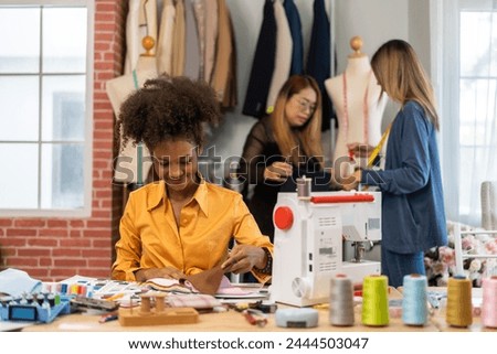 Collaboration and creativity in fashion design of teamwork, three diverse and talented designer collaborating on fabric swatches and design choices, creative studio, textile industry, fabric selection