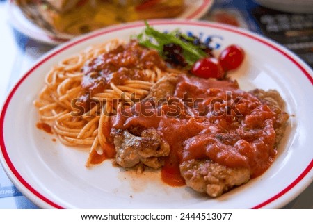 Delicious tomato pork chop with pasta in Hong Kong tea restaurant