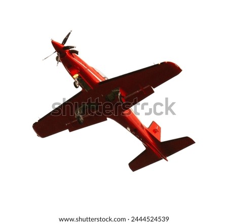 Underside view of single engine turboprop monoplane isolated on white background. Royalty-Free Stock Photo #2444524539