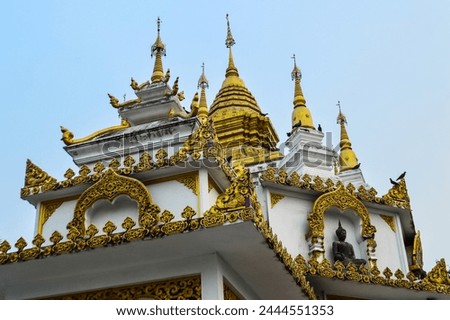Golden Pagoda, Lanna architecture in Atmosphere Evening at Chiangmai, Northern Thailand