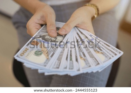 Money dollar bill in hand