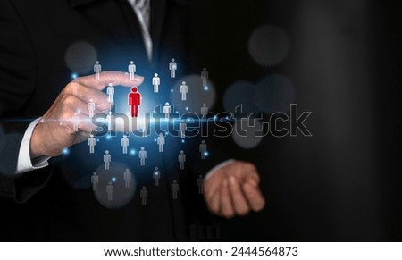Human resource,talent management and recruitment business concept.Businessman hand point to potential people,Successful business team leader concept.