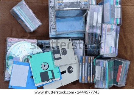 Technological waste in the form of floppy disks and compact disks