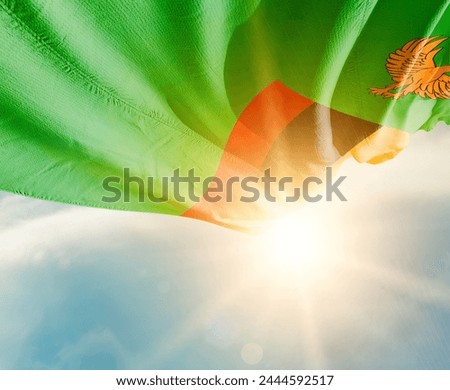 Zambia waving flag in beautiful sunlight.