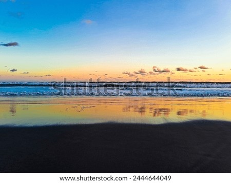 Beautiful beach view in the afternoon. Colorful sunset over the ocean at Depok Beach Indonesia