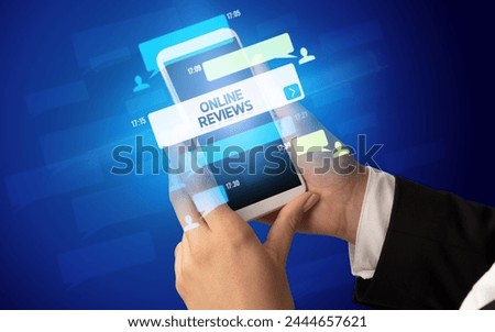 Hand using smartphone with social media concept