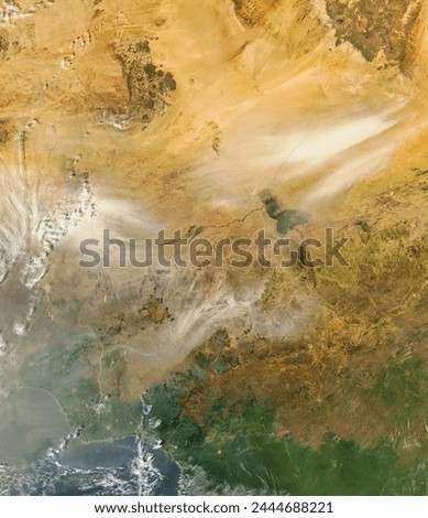 Dust and fires across Central Africa. Dust and fires across Central Africa. Elements of this image furnished by NASA. Royalty-Free Stock Photo #2444688221