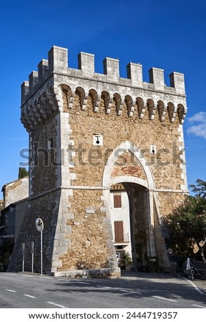 stone, medieval entrance gate to the city of Pereta in Tuscany, Italy