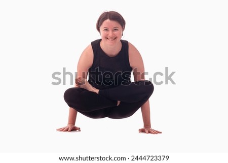 Utpluthih asana, Ashtanga yoga  Side view of woman wearing sportswear doing Yoga exercise against white background. 