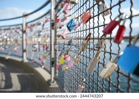 Love Padlocks on a Fence in Konstanz, Germany. Symbol of Love lasting forever. 