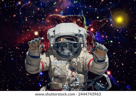 Astronaut against deep space. The elements of this image furnished by NASA.

