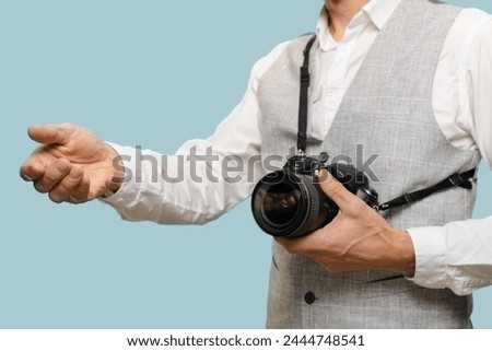 Closeup of male professional photographer getting salary for his work, It implies that his keen eye is not only a source of creative fulfillment but also a means of financial prosperity.