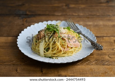 Pasta with potherb mustard, prosciutto and onion