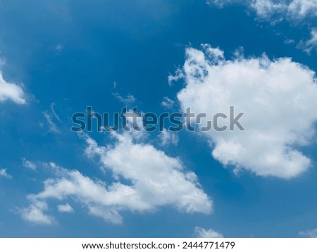 The weather is good, causing large and small cumulus clouds to float along in the wind beautiful at Bangkok, Thailand.no focus.
