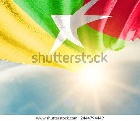Myanmar  waving flag in beautiful sunlight.