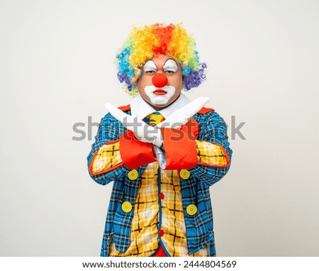 Mr Clown. Portrait of Funny face Clown man in colorful uniform standing variety action. Happy expression male bozo in various pose on isolated background.