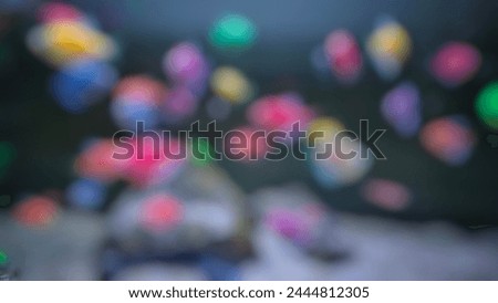 abstract background of out-of-focus glowfish in the aquarium