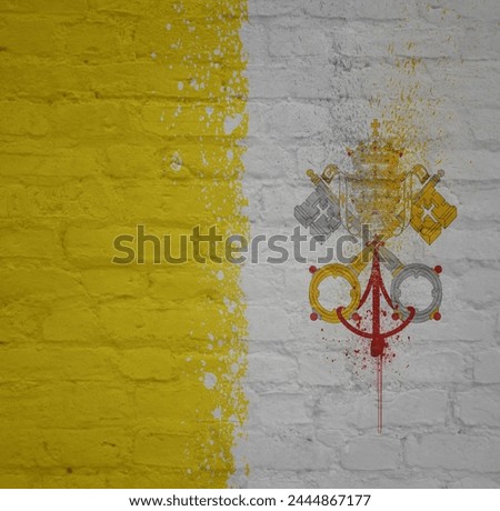 colorful painted big national flag of vatican city on a massive old brick wall