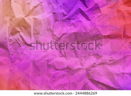 close up texture of gradient neon purple, red, pink crumpled or torn craft paper use as background with blank space for design. abstract creased recycle neon paper texture for fantasy concept.