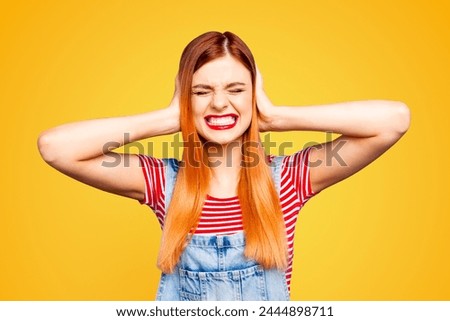 Omg it's too much Close up photo portrait of sad upset unhappy unsatisfied aggressive girl closing ears with palms isolated bright background Royalty-Free Stock Photo #2444898711