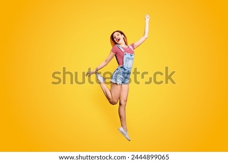 Ha-ha people person concept. Full length size body studio photo portrait of satisfied glad nice sweet lovely with beaming smile girl jumping up raising hands up isolated bright background Royalty-Free Stock Photo #2444899065