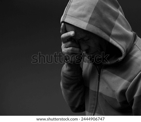 praying to god with hands together on grey background with people stock image stock photo