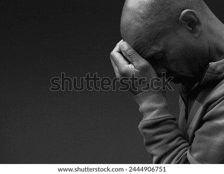 praying to god with hands together on grey background with people stock image stock photo