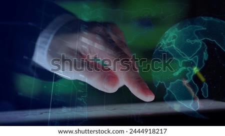 Hands of businessman and businesswoman working on laptop in modern office with double exposure of planet earth hologram